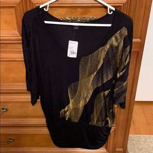 Brand new with tags, black and gold top.